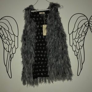 Stringy black and gray vest